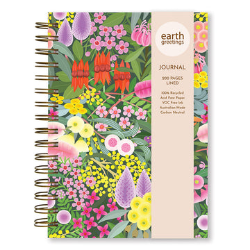 Front cover of a spiral bound journal illustrated with colourful flowers and a product information label.