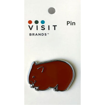 Brown wombat-shaped pin on a white card with 'Visit Brands' branding.