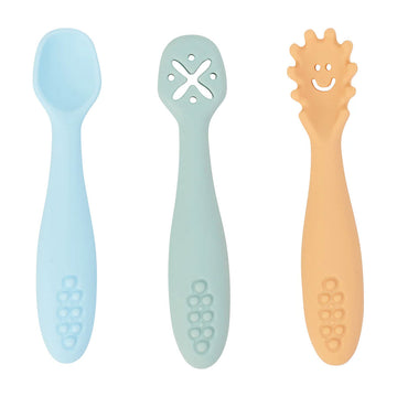 A set of cutlery made from silicone with blue, green and orange pieces.