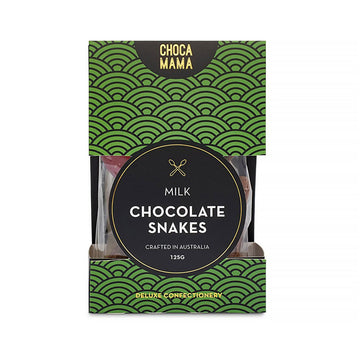 A green and black patterned box with the heading 'Chocolate Snakes' in the middle and a window on the sides showing the chocolate inside.