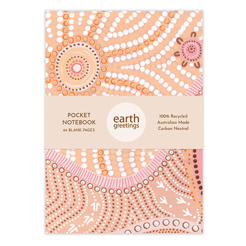Front cover of a notebook with artwork of a sun in orange and white with a product information sleeve over the front.