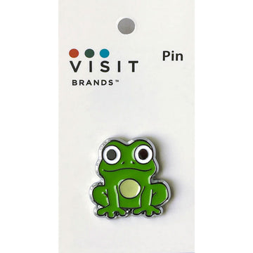 Green frog-shaped pin on a white card with 'Visit Brands' branding.