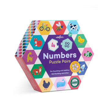 A hexagon box titled 'Numbers Puzzle Pairs' with illustrations of different animals around the box including a giraffe, tiger, fox and chicken.