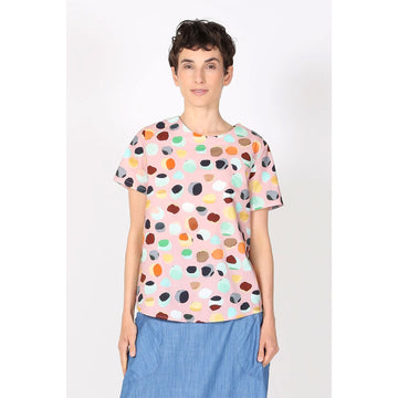 Colorful polka dot t-shirt on a white background.