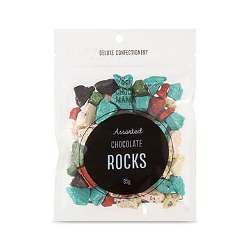A small clear bag with the heading 'Assorted Chocolate Rocks' in the middle. The chocolate rocks can be seen inside the bag.