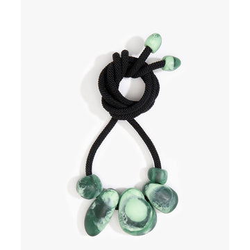 A necklace with large moss green resin beads on a thick black cord.