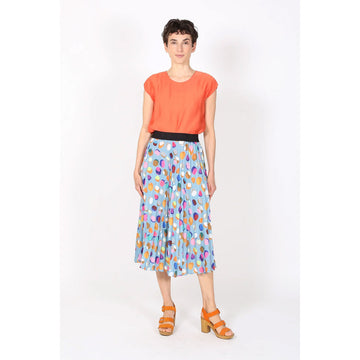 Colorful polka dot skirt on a white background.