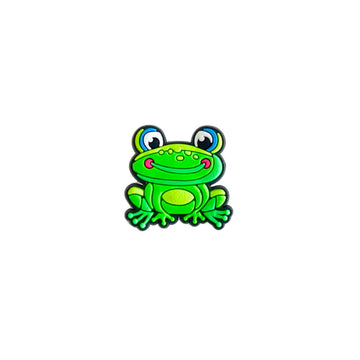 Cartoon green frog with blue eyes PVC shoe charm on a white background.