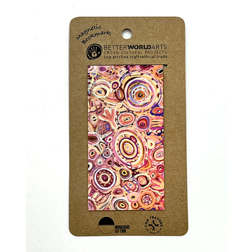 A magnetic bookmark printed with artwork by Cedric Varcoe attached to a brown card.