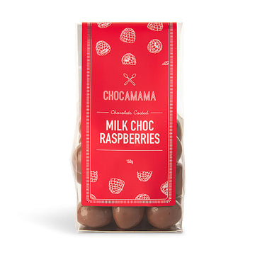 A clear bag filled with chocolate covered raspberry jellies with a large red product label and the text 'Chocomama Milk Choc Raspberries'.