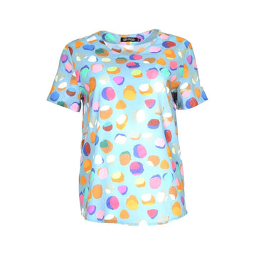 Colorful polka dot t-shirt on a white background.