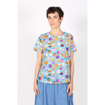 Colorful polka dot t-shirt on a white background.