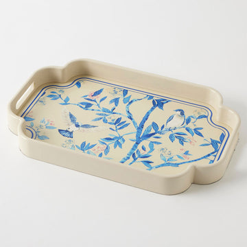 Beige tray with blue floral and bird design on a white background.