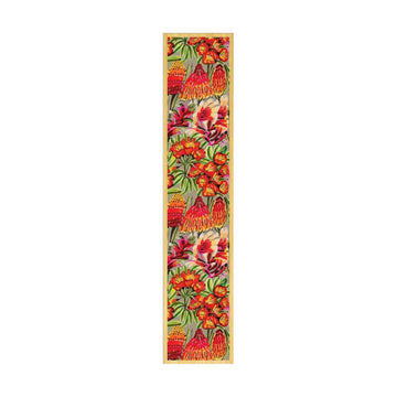 Decorative wooden bookmark with floral pattern on a white background.