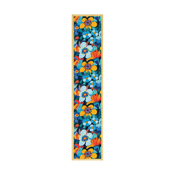 Colorful floral pattern printed on a wooden bookmark.