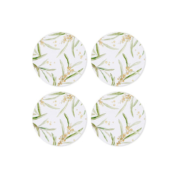Four round coasters with floral design on a white background.