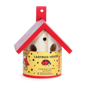 A wooden house with a red roof and a product label around it with the heading 'Ladybug House'.