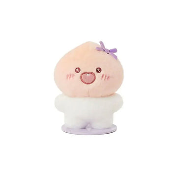 Plush toy with a round face, pink cheeks, and a small purple bow on a white background.
