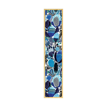 Decorative wooden bookmark with blue floral pattern on a white background.