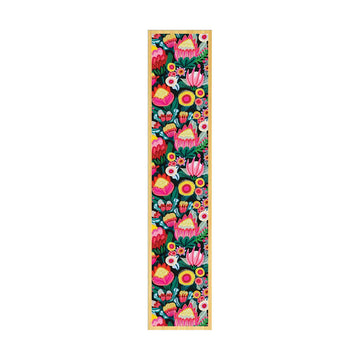 Floral patterned wooden bookmark on a white background.