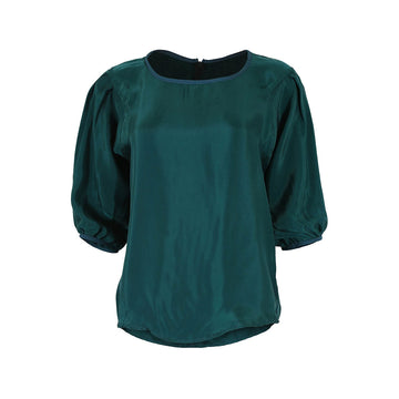 Front view of a teal green blouse with half length gathered sleeves.