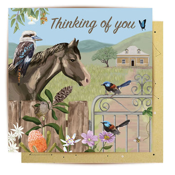 Greeting card with a horse, birds, and scenic background, featuring the text 'Thinking of you'.