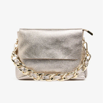 A small gold bag with a short gold chain strap.