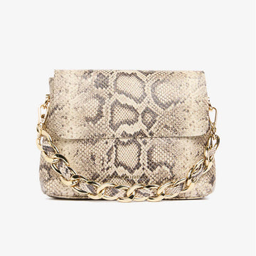 A small snake printed bag with a short gold chain strap.