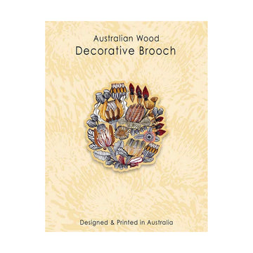 Decorative brooch on a textured beige card with 'Australian Wood Decorative Brooch' text