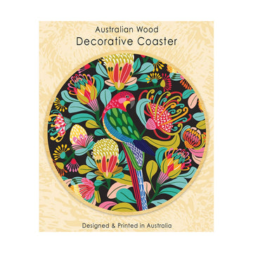 A round wooden coaster illustrated with a rosella and flowers attached to a packaging card.