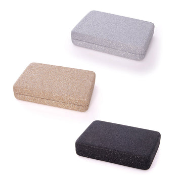 Three rectangle shaped cases in silver glitter, gold glitter and black glitter.