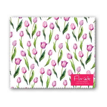 A lens cloth printed with purple watercolour tulips.