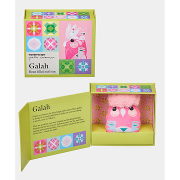 A soft toy shaped like a galah bird in pink in a slightly abstract shape.