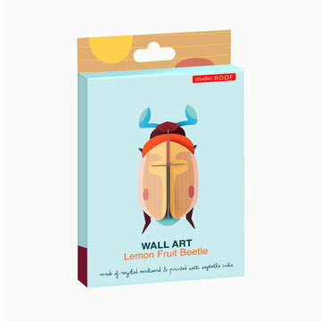 Packaging of wall art featuring a lemon fruit beetle design on a light blue background.