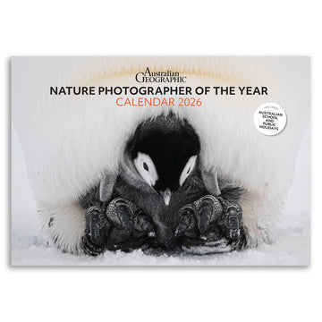 Calendar cover featuring a penguin in a snowy scene with 'Australian Geographic' branding.