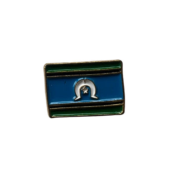 An enamel charm shaped and engraved with the Torres Strait Islander flag.