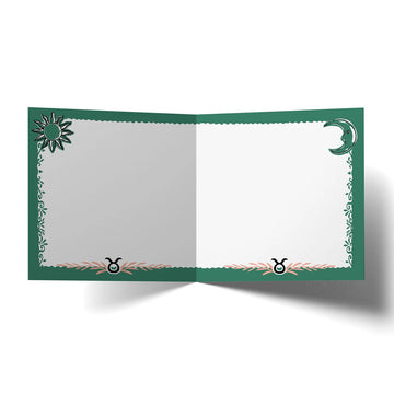 A square greeting card with an illustration of a sleeping wombat and the heading 'Taurus'.