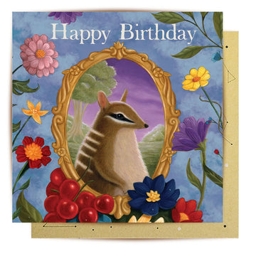 A square greeting card with an illustration of an animals in a frame surrounded by fruits and flowers.