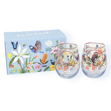 Two stemless wine glasses with animal and floral designs with a decorative box on a white background.