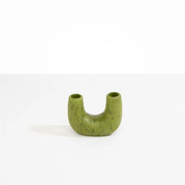 A U shaped vase in olive green resin.