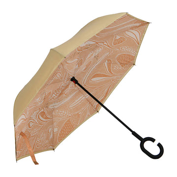 Beige umbrella with a unique pattern and black handle on a white background.