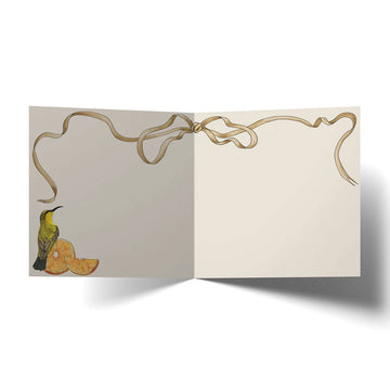 A square greeting card with an illustration of a bird surrounded by fruits and flowers in an orange colour scheme.