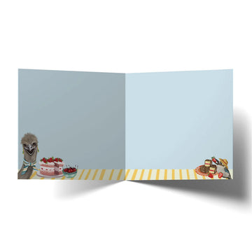 Birthday card with animals around a table with cakes and text 'Happiness multiplies when shared. Happy Birthday'.