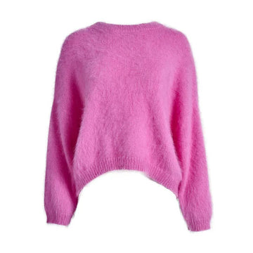 A women's angora fluffy sweater in pink with a shaped hemline.