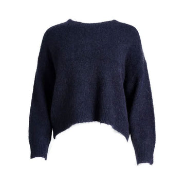 A women's sweater made from alpaca wool in navy.