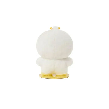 Cartoon duck plushie with a yellow bow on a white background.