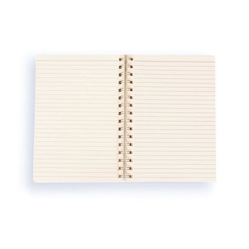 Notebook with floral and bird design on a white background.