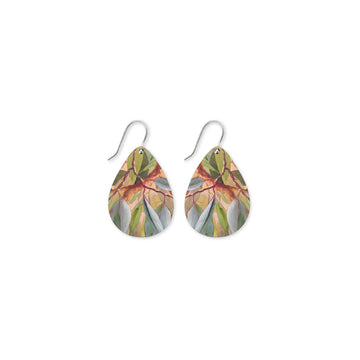 Teardrop-shaped earrings with leaf pattern on a white background.