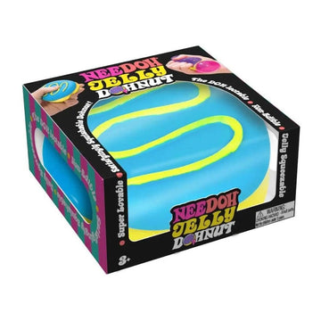 A squish toy shaped like a round donut with blue icing inside a box with a clear window.
