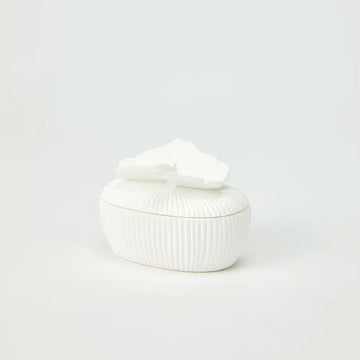 A small white ceramic trinket box with 3D butterflies on the top.
